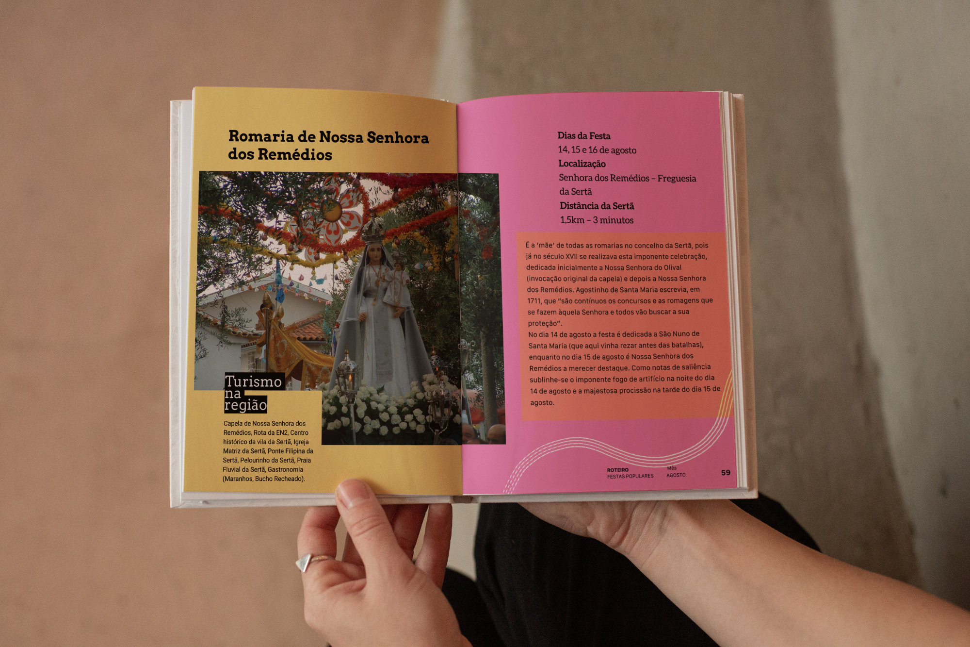 A photograph of the Annual Cultural Guide being held, showcasing the layout and the reading experience.